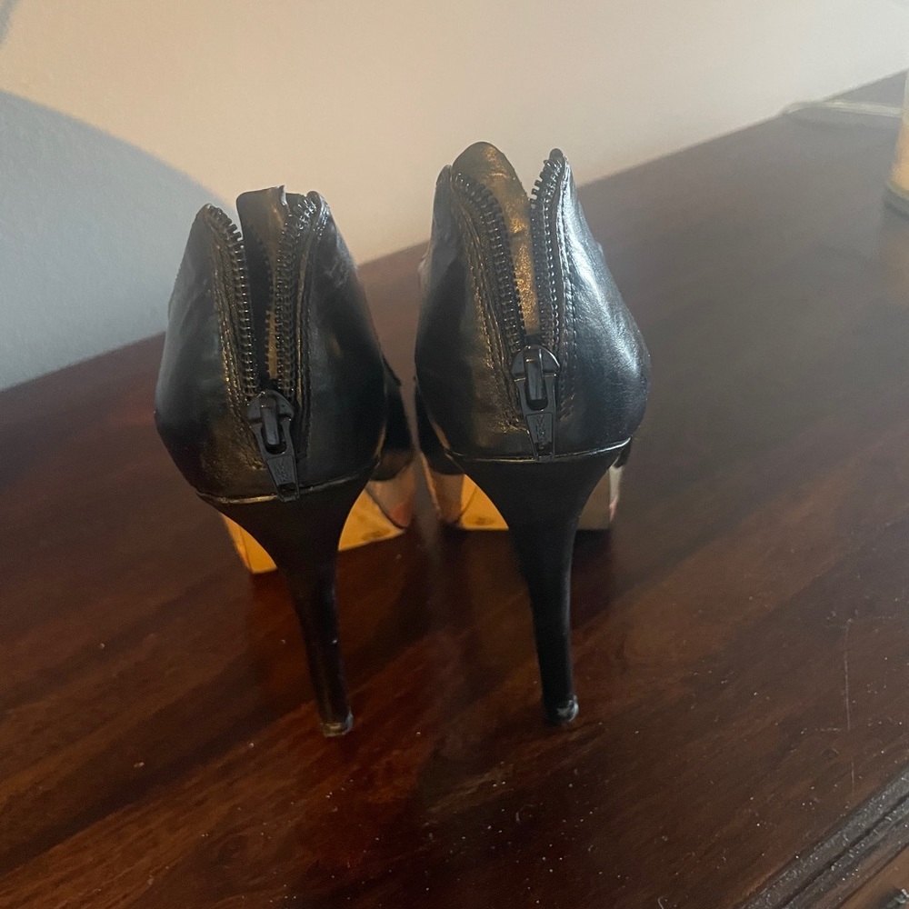 Black, bronze and Blush peep toe, open on the side pump. Jessica Simpson